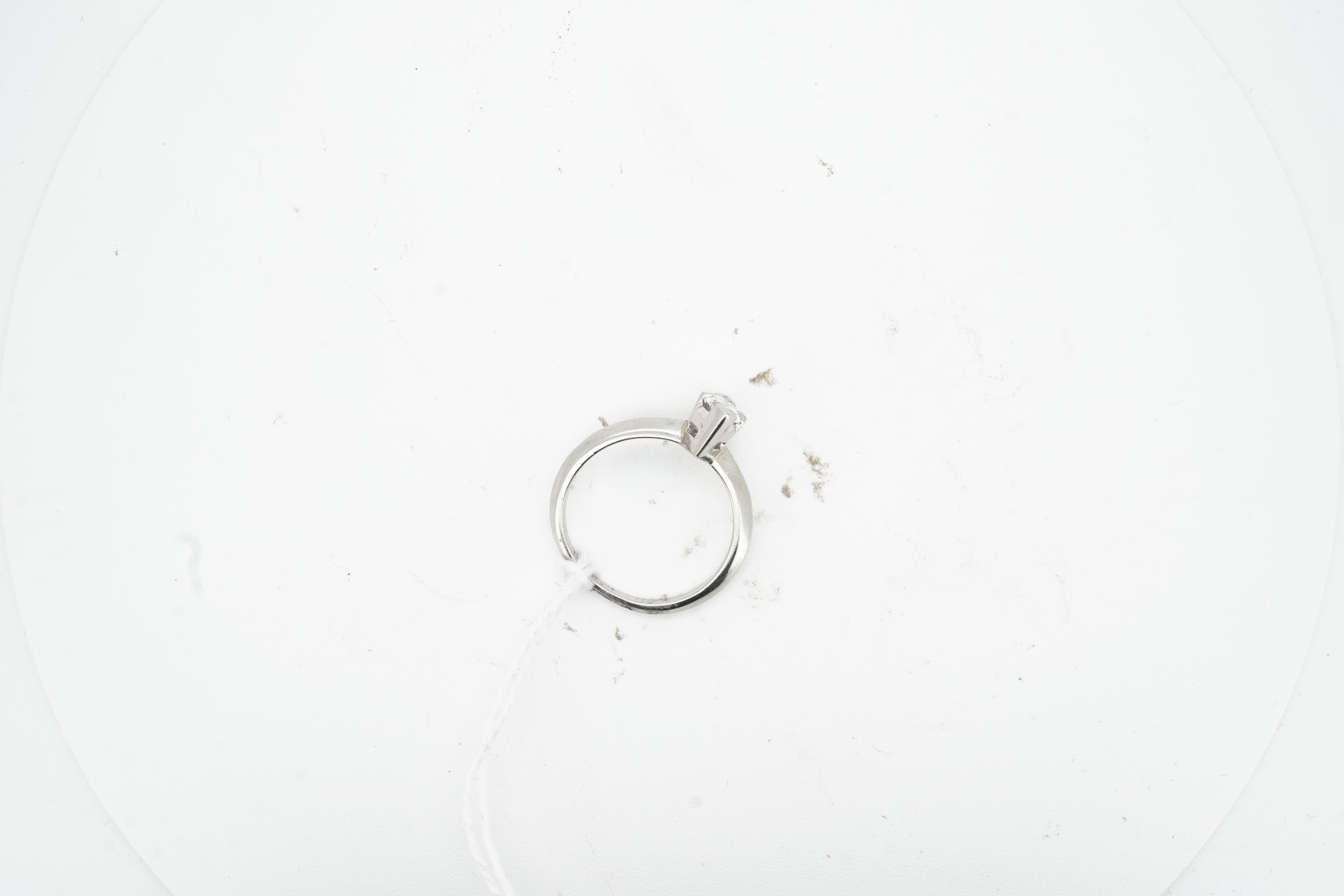 A diamond ring, claw-set with a marquise-shaped diamond weighing approximately 0.50 carats, mounted in platinum, size L, British hallmarks, gross weight approximately 4 grams